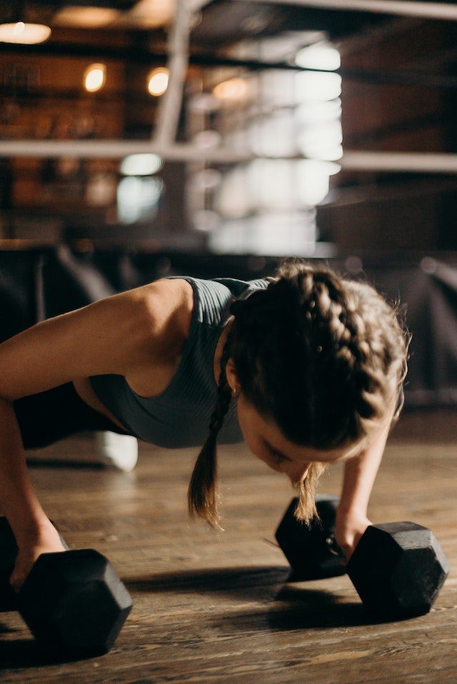 Getting Motivated to Lose Weight woman doing push ups